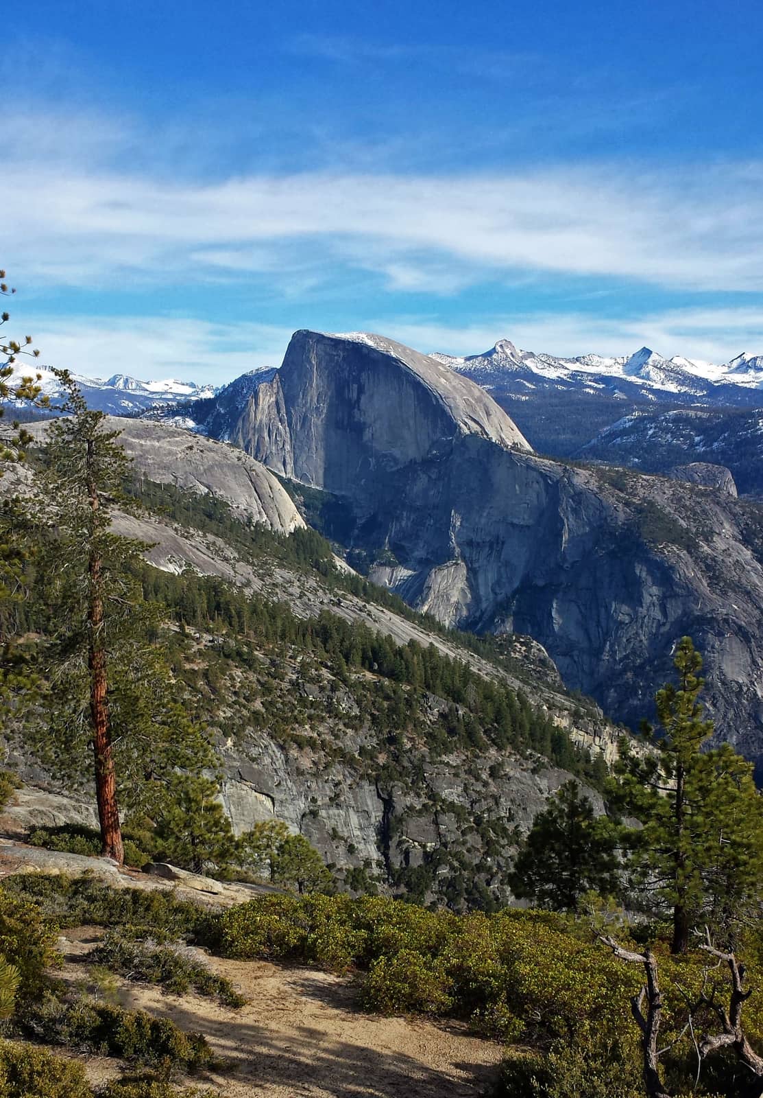 Yosemite National Park: Granite dome with trace amounts of snow.